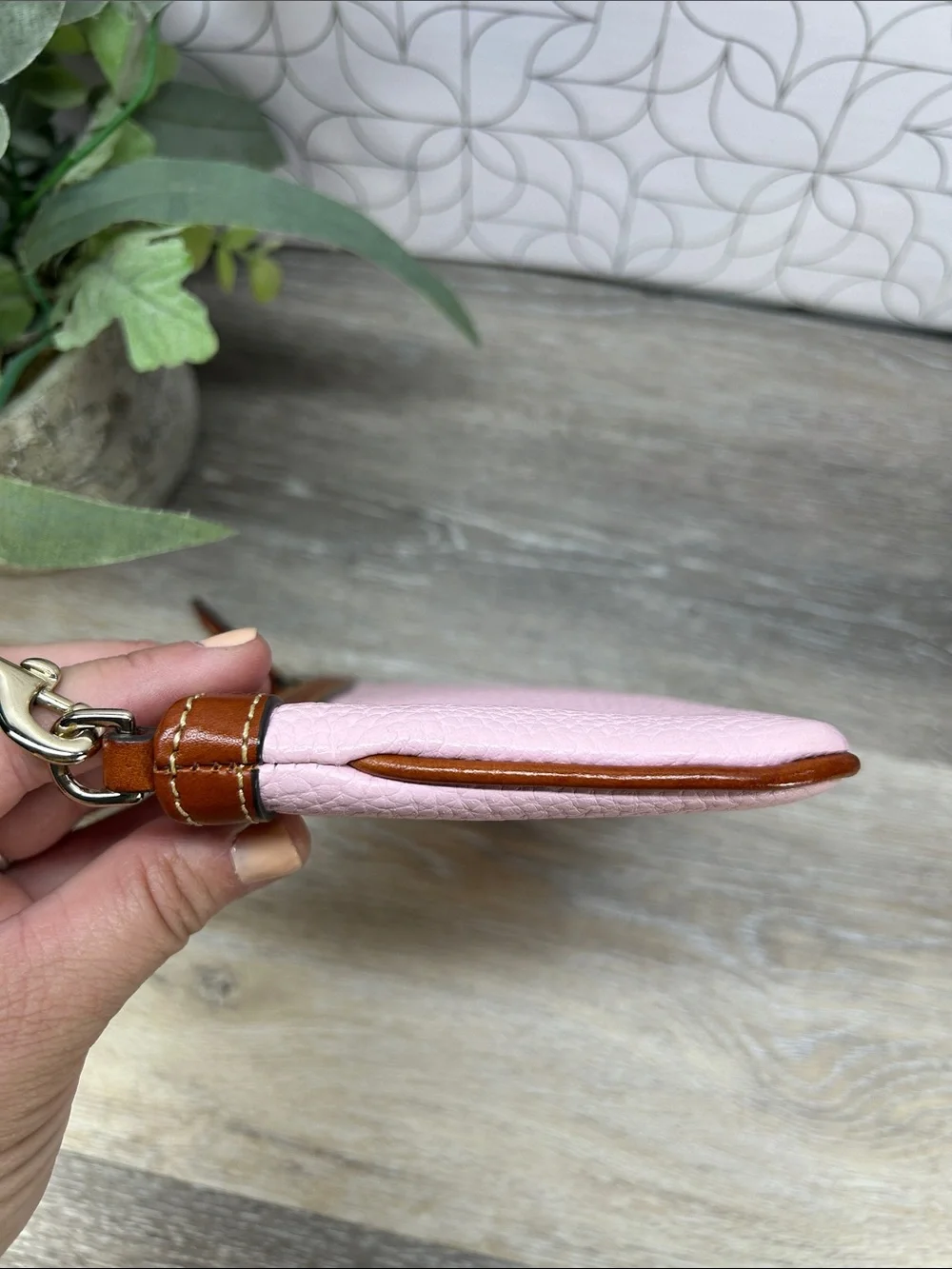 3661 Dooney & Bourke Brown Leather Wristlet with Red Lining 053661